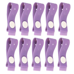 Purple latex free disposable tourniquet strap with stud fastener, ideal for medical vein access procedures.
