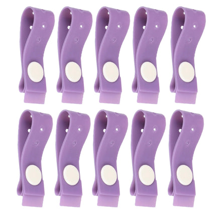 Purple latex free disposable tourniquet strap with stud fastener, ideal for medical vein access procedures.