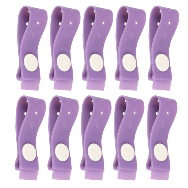 Purple latex free disposable tourniquet strap with stud fastener, ideal for medical vein access procedures.