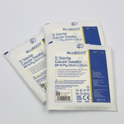 Three packages of Bluedot sterile gauze swabs on a white background