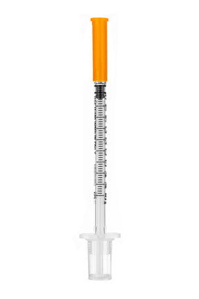 Medical syringe with an orange cap on a white background