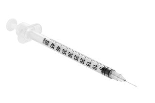 Medical syringe with needle on a white background