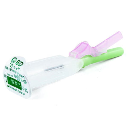 A plastic medical applicator tool with a translucent white body, green handle, and pink top piece, photographed on a plain white background.