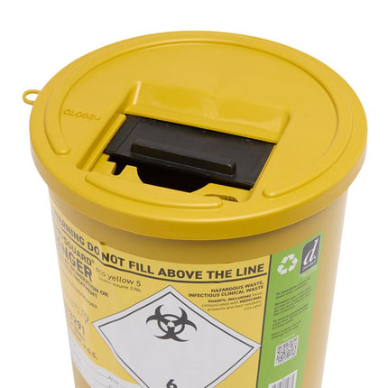 A yellow hazardous waste container with a yellow lid and a black opening, shown on a white background. The label includes a biohazard symbol and a green recycling side panel.