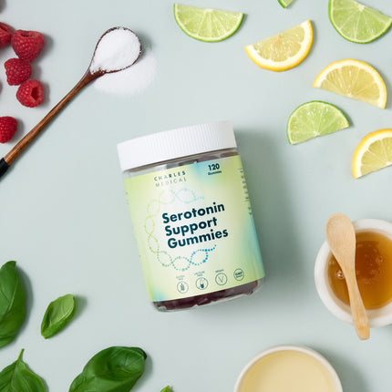 Vegan serotonin support gummies jar surrounded by fruits, promoting mood balance and relaxation with 120 sugar-free gummies.