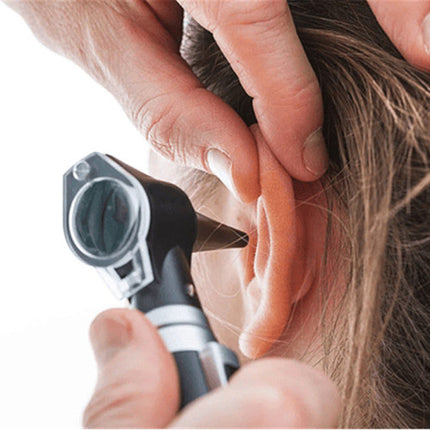 Person using an otoscope to examine an ear