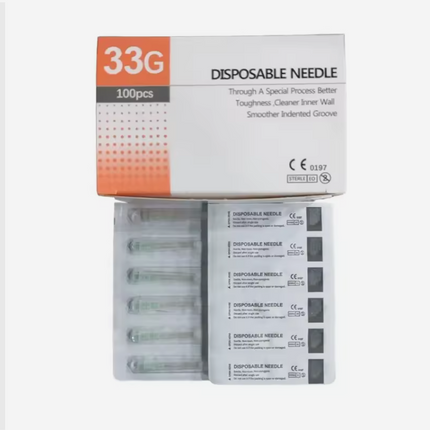 Box of disposable needles with 100 pieces, labeled '33G'.