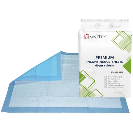 OmniTex premium incontinence sheets shown partially unfolded with their retail packaging bag on a plain white background.